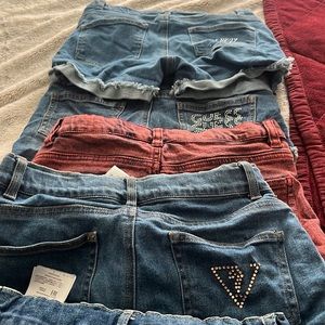 Guess Jean Shorts 5 for 35$ 2 pair have a couple of crystal missing.